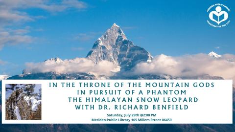 A picture of the Himalayas looms behind a picture of the elusive snow leopard